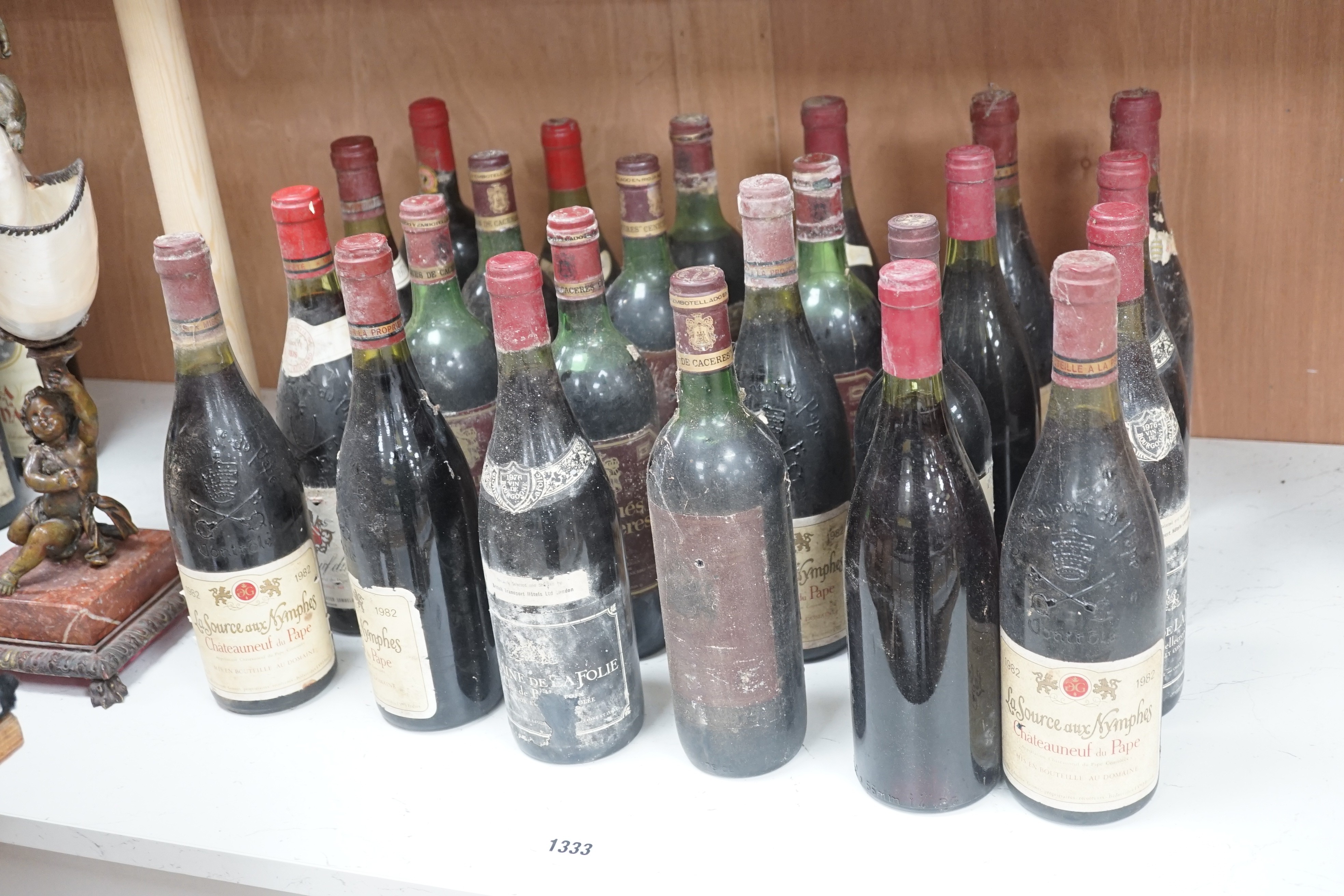 24 bottles of assorted red wine including - four la Source aux Nymphes Chateauneuf du Pape 1982